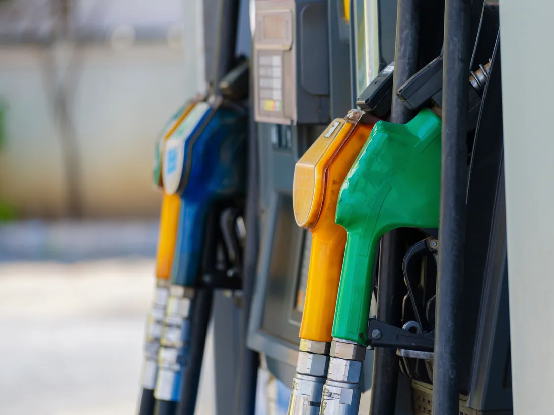 Multi-product fuel dispenser under a station canopy.