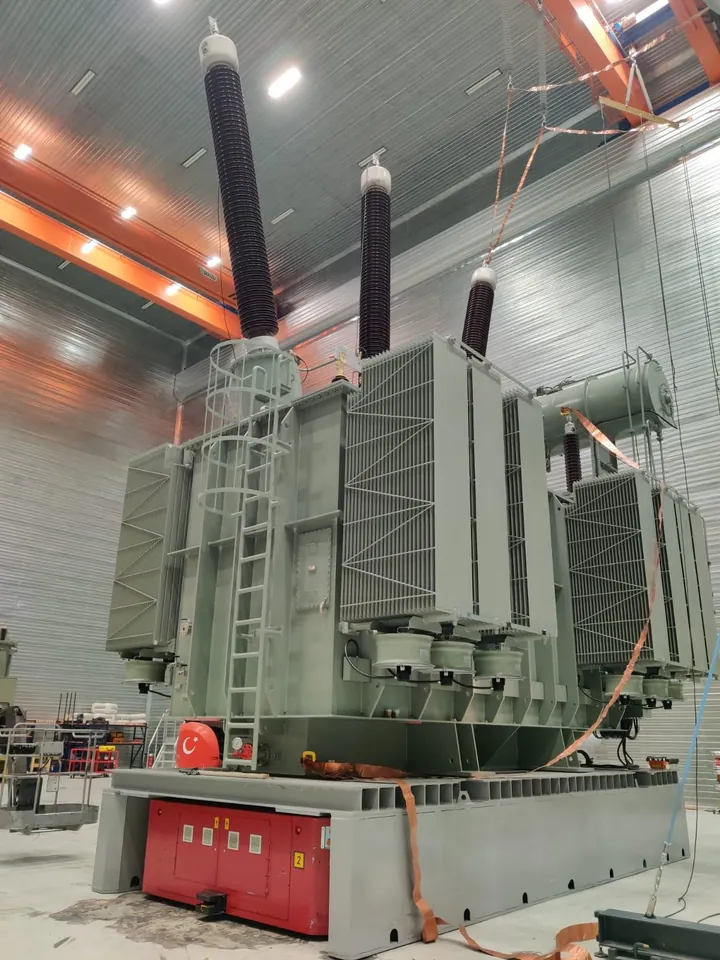 Power transformer in a factory hall.